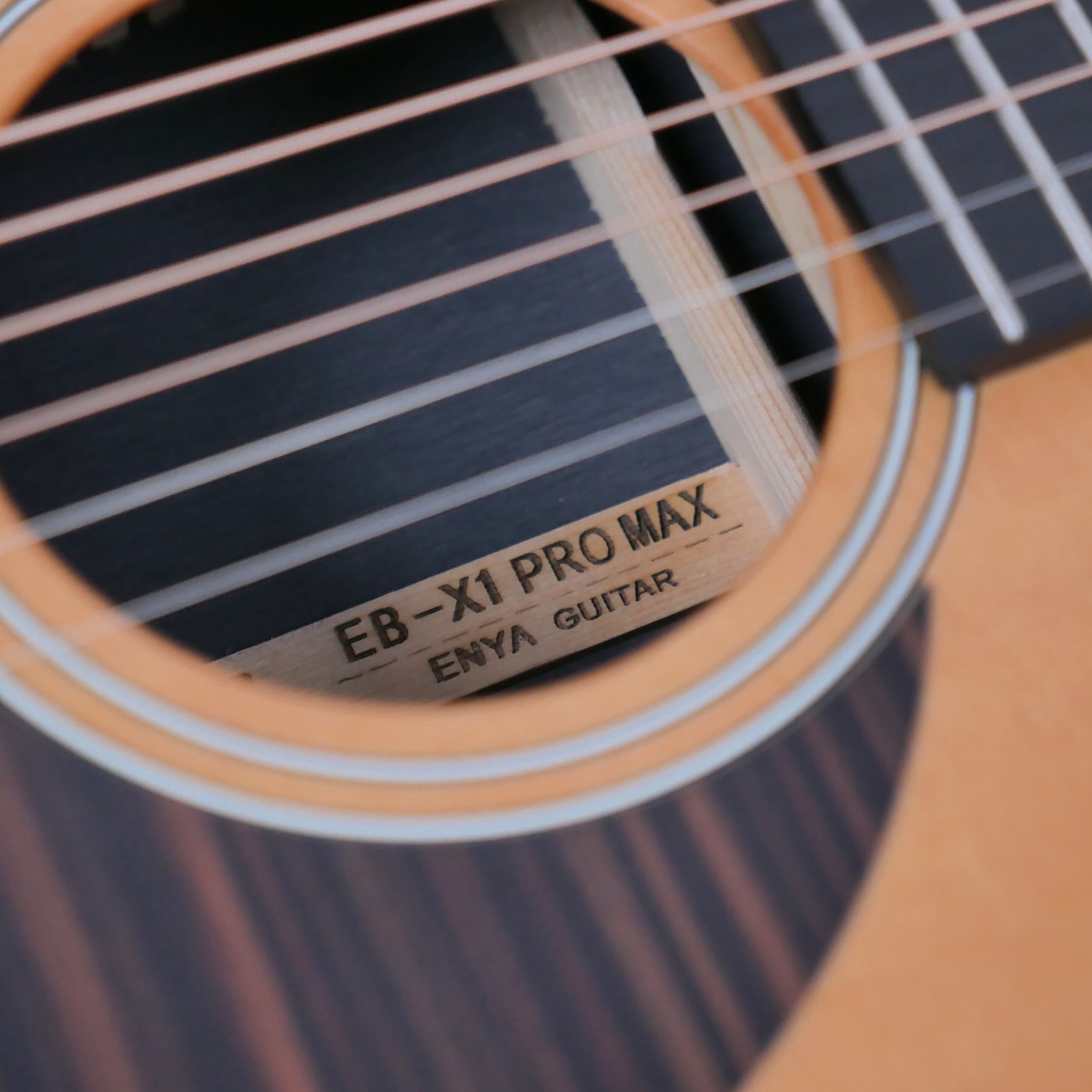 Enya EB-X1 Pro Max SP1 Natural Matt - soundhole rosette close-up