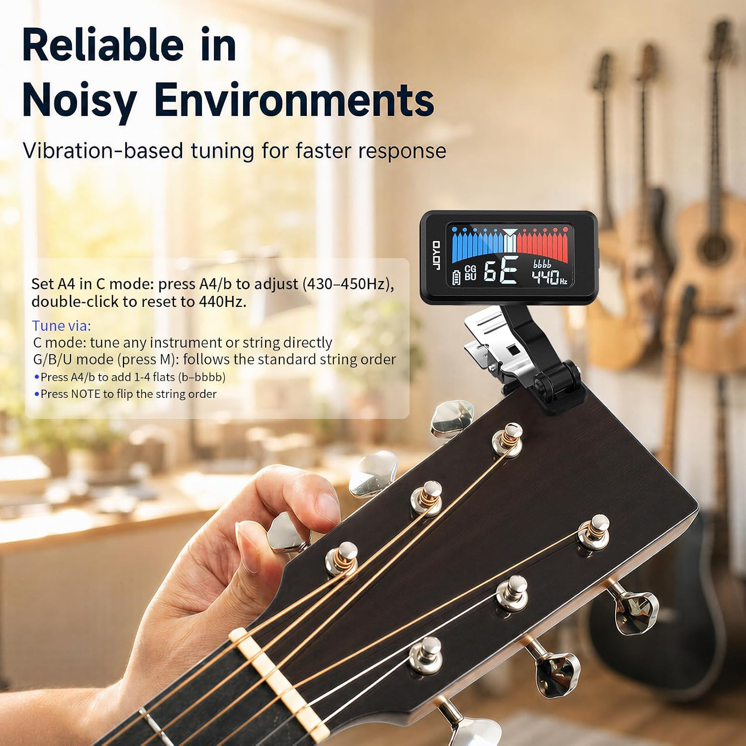JOYO JT-480 vibration tuning on an acoustic guitar headstock