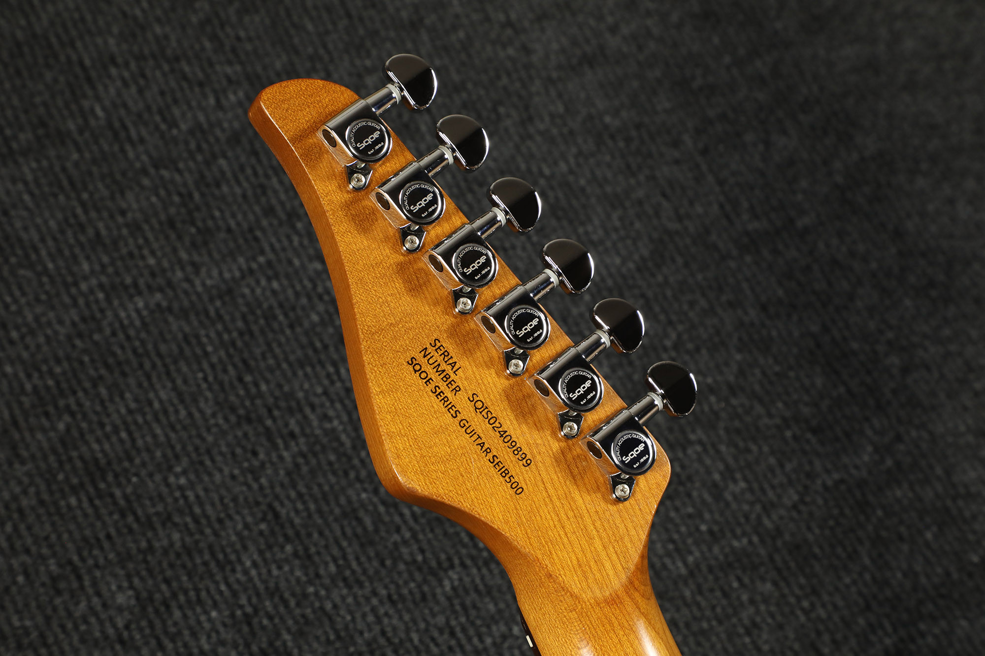 SQOE SEIB500 Storm Galaxy Blue headstock back and sealed tuners