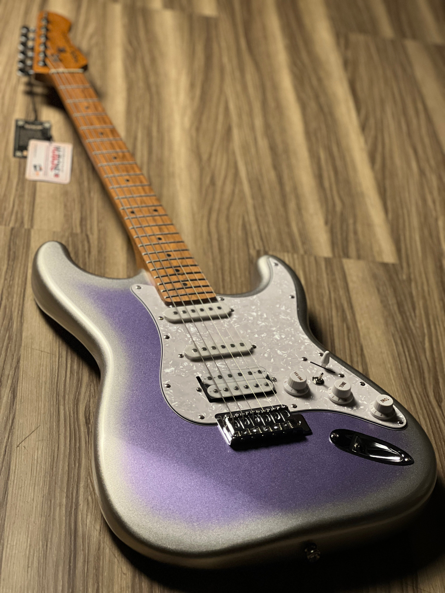 SQOE SEST610 Ice Flower Purple full guitar on wooden floor