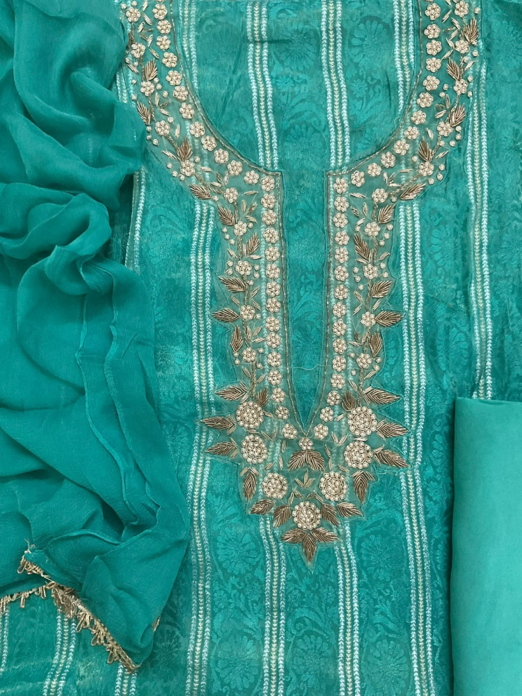 Image of Soft Tissue Chanderi Self Weaved Embroidered Suit - Green