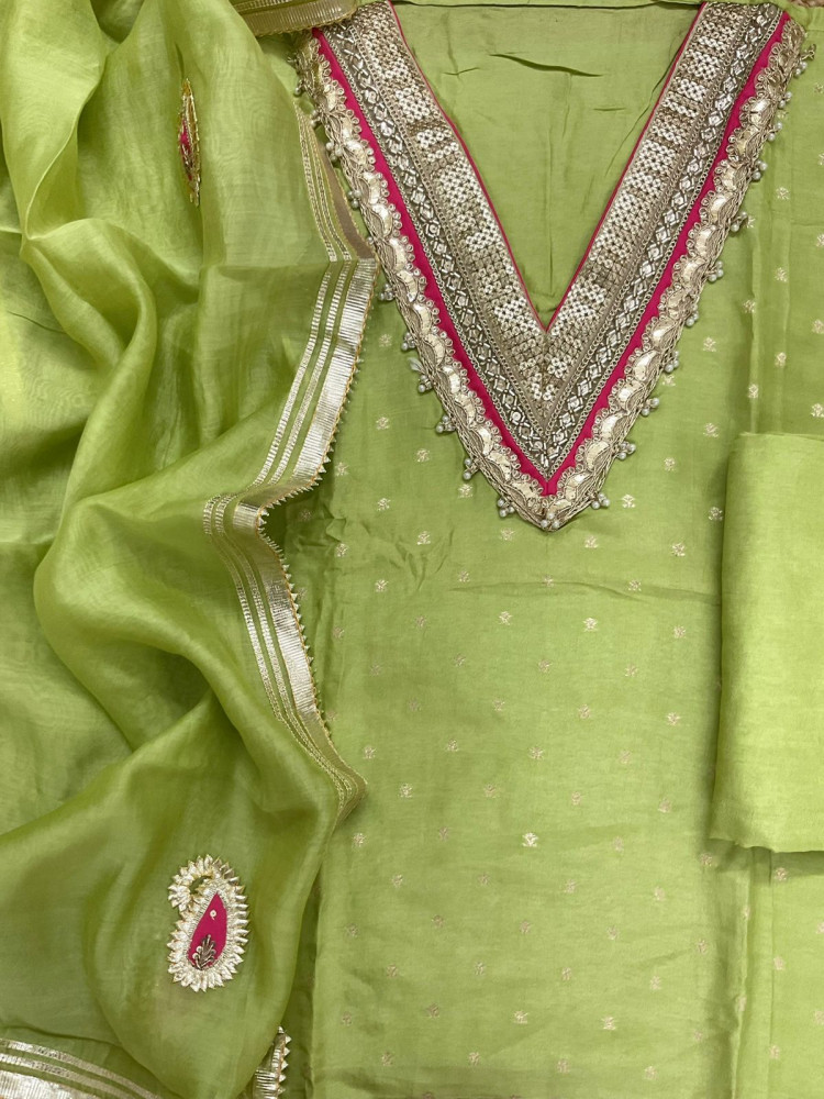 Image of Soft Dola Silk Banarasi Weaved Embroidered Suit - Green