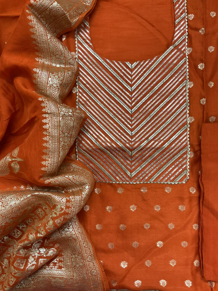 Image of Pure Upada Silk Banarasi Weaved Embroidered Suit - Orange