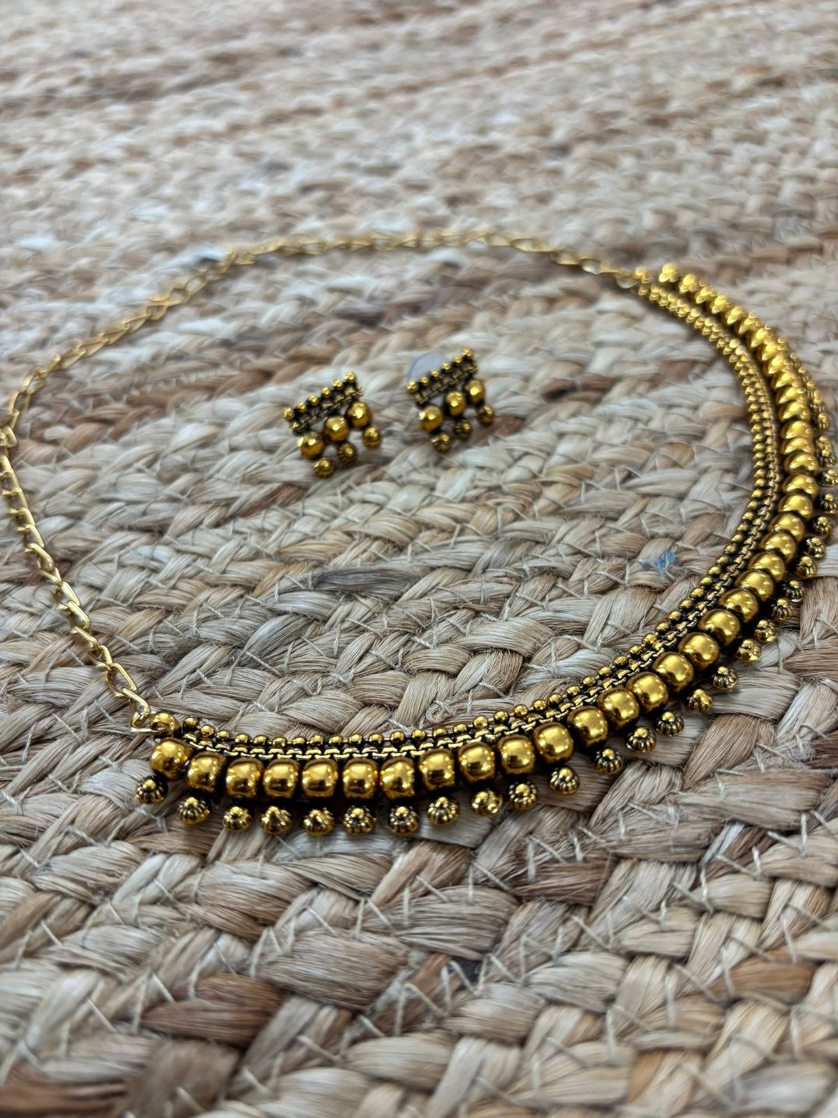 Metallic Oxidised Gold Necklace Set With Earrings - Gold