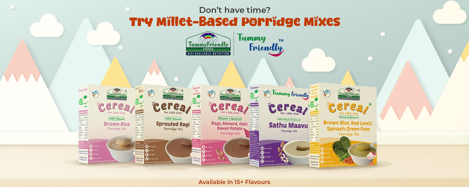 Advertisement for Millet-Based Porridge Mixes by Tummy Friendly Foods. The image shows five different cereal porridge mix packages lined up in front of a pastel-colored background with mountains, clouds, and stars. The text reads: 'Don't have time? Try Millet-Based Porridge Mixes' with the Tummy Friendly Foods logo and tagline 'Bio-Available Nutrition'. The cereal flavors shown are Brown Rice, Sprouted Ragi, Ragi Almond Oats Sweet Potato, Sathu Maavu, and Brown Rice Red Lentil Spinach Green Peas. The bottom text states: 'Available in 15+ Flavours.'