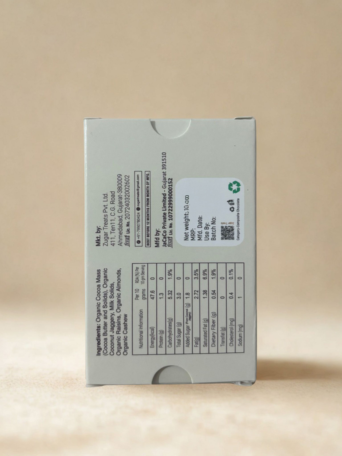 Back view of Zugar Raisins  Nuts Milk Chocolate box showing ingredients nutrition facts and labels a zero-refined-sugar chocolate sweetened with coconut jaggery