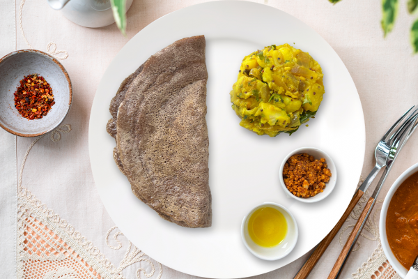 Sprouted ragi dosa, or finger millet crepe