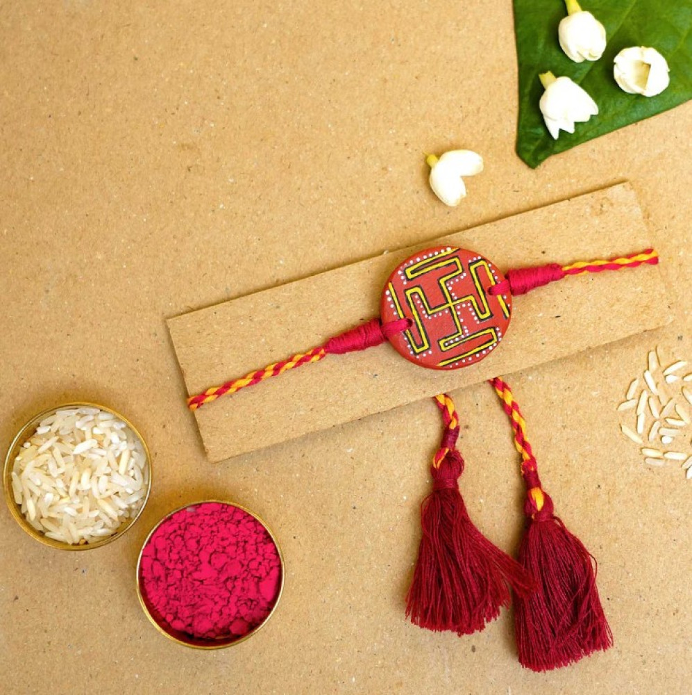 Hand-painted Swastik Terracotta Rakhi With Roli Chawal