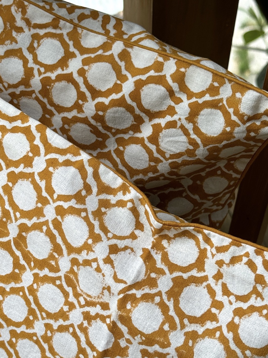 Dabu mustard block printed cushion covers - set of 2