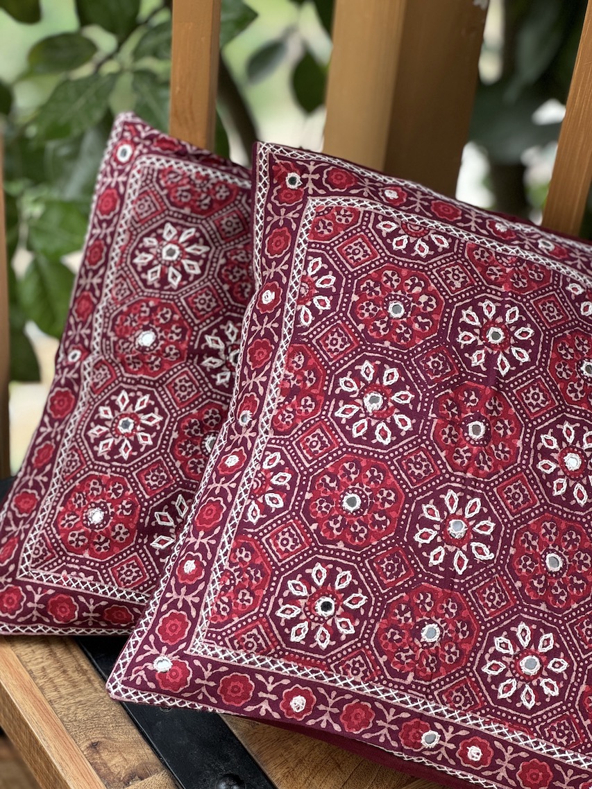 Maroon hand embroidered ajrakh printed cushion covers - set of 2