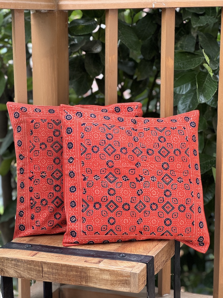 Orange ajrakh printed cushion covers - set of 2