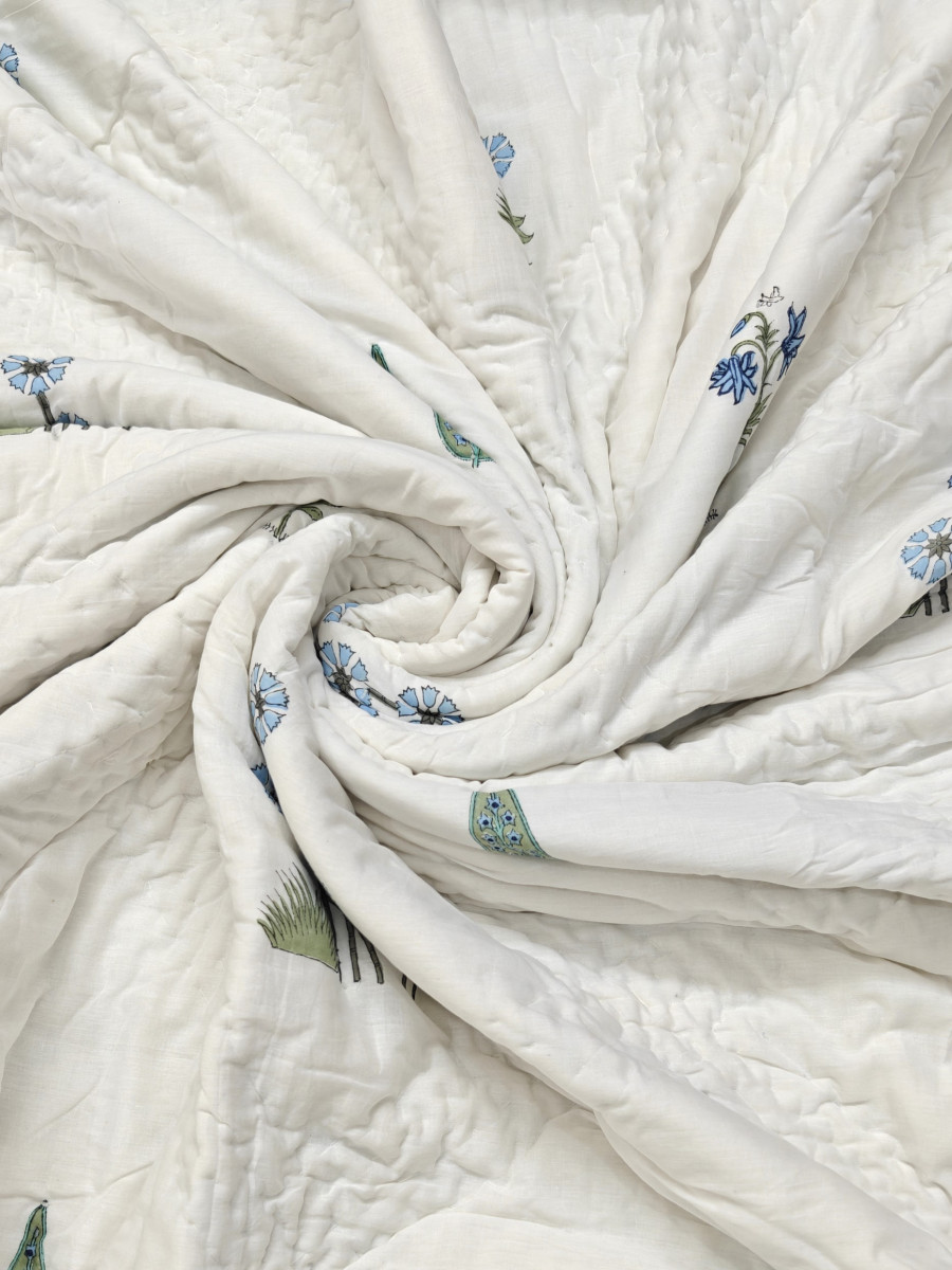 Lightweight Jaipuri razai in white mulmul cotton with blue floral hand block print