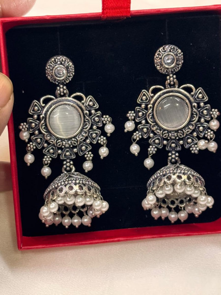 Oxidized Silver Plated Statement Jhumka Earrings with White Cat's Eye Stone and Pearl Drops