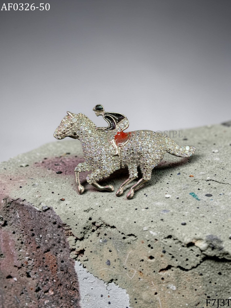 Image of horses riding  brooch