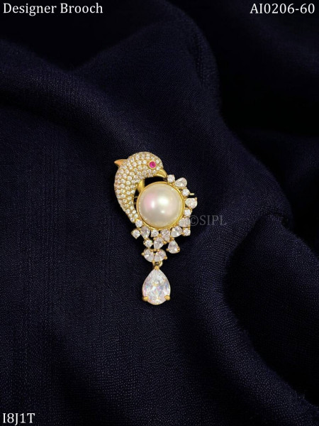 Playing dolphin brooch