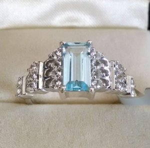 Image of Big Blue topaz Baguette with white topaz ring