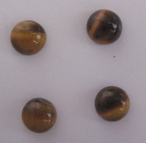 Image of Tiger Eye round cab gem stone