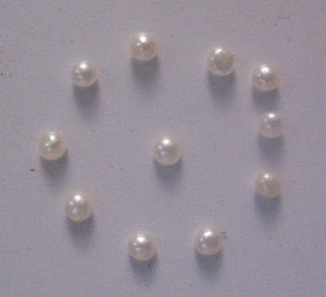 Image of White pearl round cab