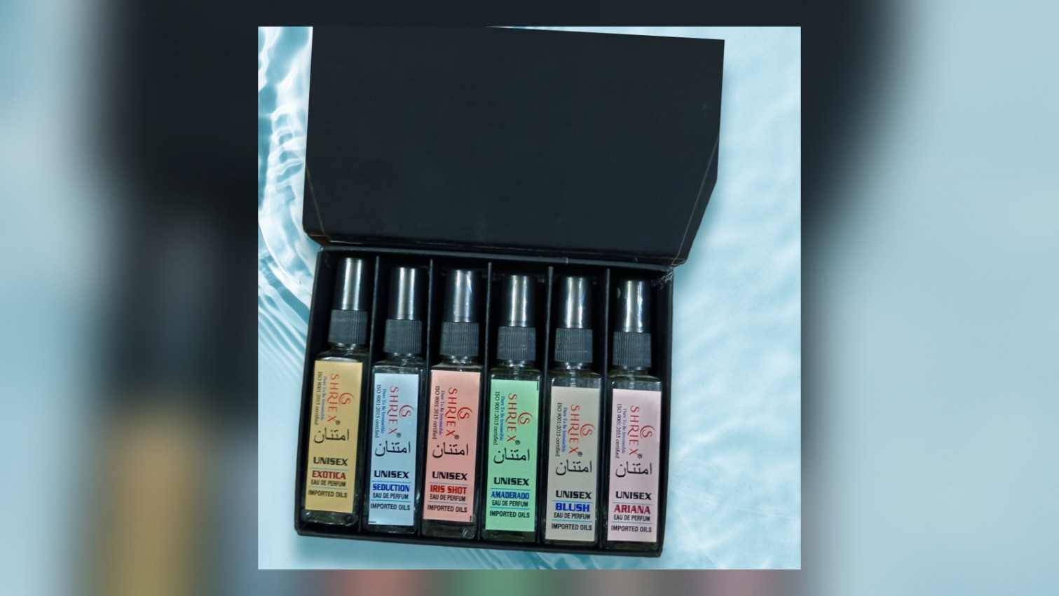 Shriex perfume bottles in their box