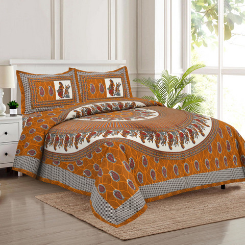 Rust-orange Jaipuri mandala print king-size cotton bedsheet 100x108 spread on bed with two matching pillow covers