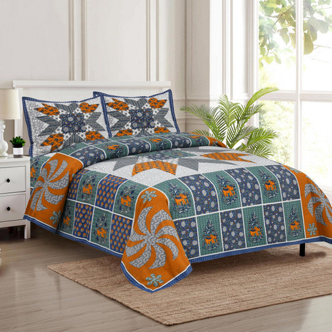 Regal patchwork elephant Jaipuri block-print king-size cotton bedsheet 100108 spread on bed with two matching pillow covers showing mandala paisley and elephant motifs