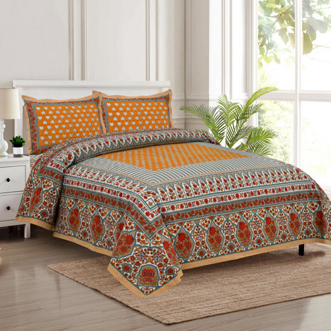 Royal marigold teardrop Jaipuri block-print king-size cotton bedsheet 100108 spread on bed with two matching pillow covers and printed border