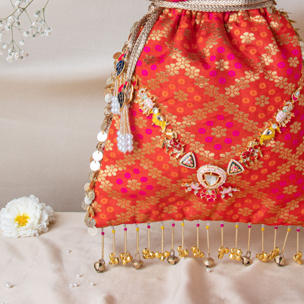 Royal Red Banarasi Brocade Potli Bag with Meenakari Work | Shubhams Zari
