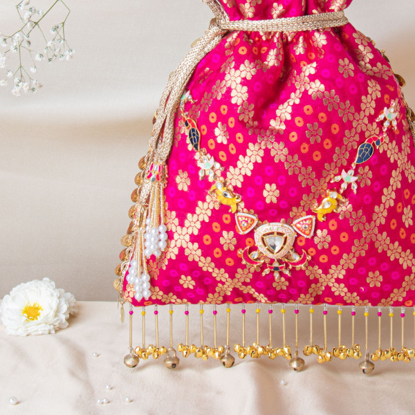 Royal Pink Banarasi Brocade Potli with Kundan-Meenakari Heritage Details