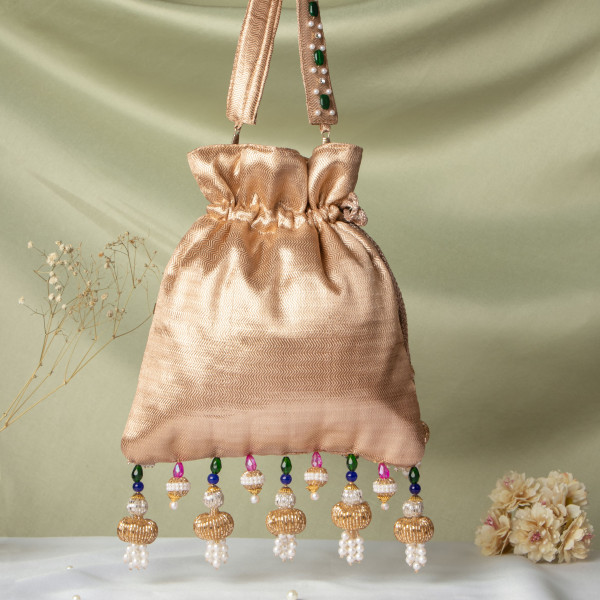 Golden Jewellery Shrinathji Tissue Potli | Regal Hand-Embroidered Wedding Potli