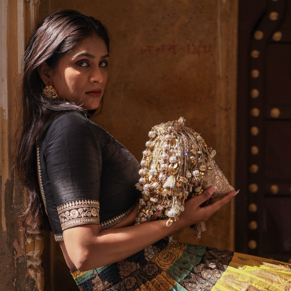Iconic Antique Gold Crushed Tissue Potli Bag with Embellished Fringes