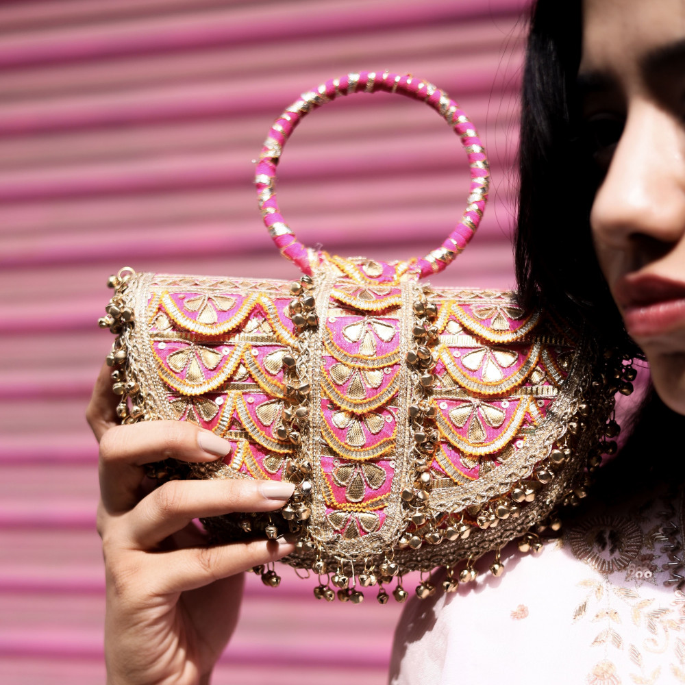 Image of Rani Pink Banarasi Silk Moon Clutch Bag with Gota Patti &amp; Ghungroos