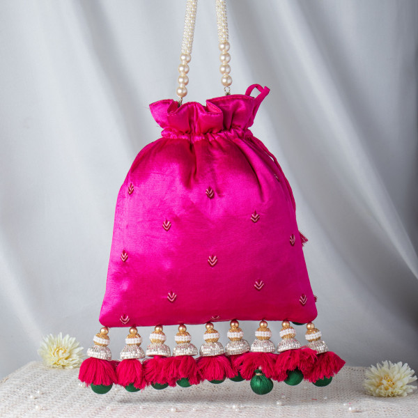 Handcrafted Shrinathji Embroidered Rani Pink Potli – Luxury Velvet Bridal Bag with Jhumka Tassels