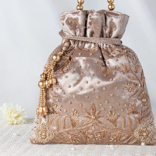 Royal Antique Copper Zardosi Potli – Hand-Crafted Metallic  Tissue  Wedding Bag with Beaded Regal Handle