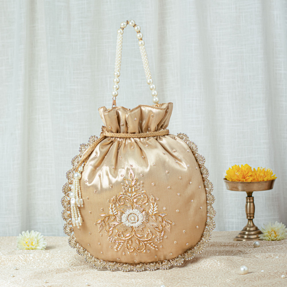 Image of Golden Zardozi Tissue Potli Bag with Pearl Handle – Single Motif Wedding Favor Potli
