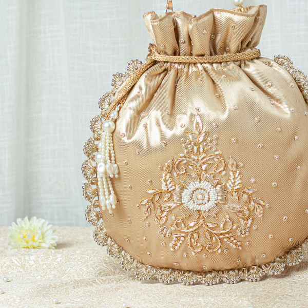 Golden Zardozi Tissue Potli Bag with Pearl Handle – Single Motif Wedding Favor Potli