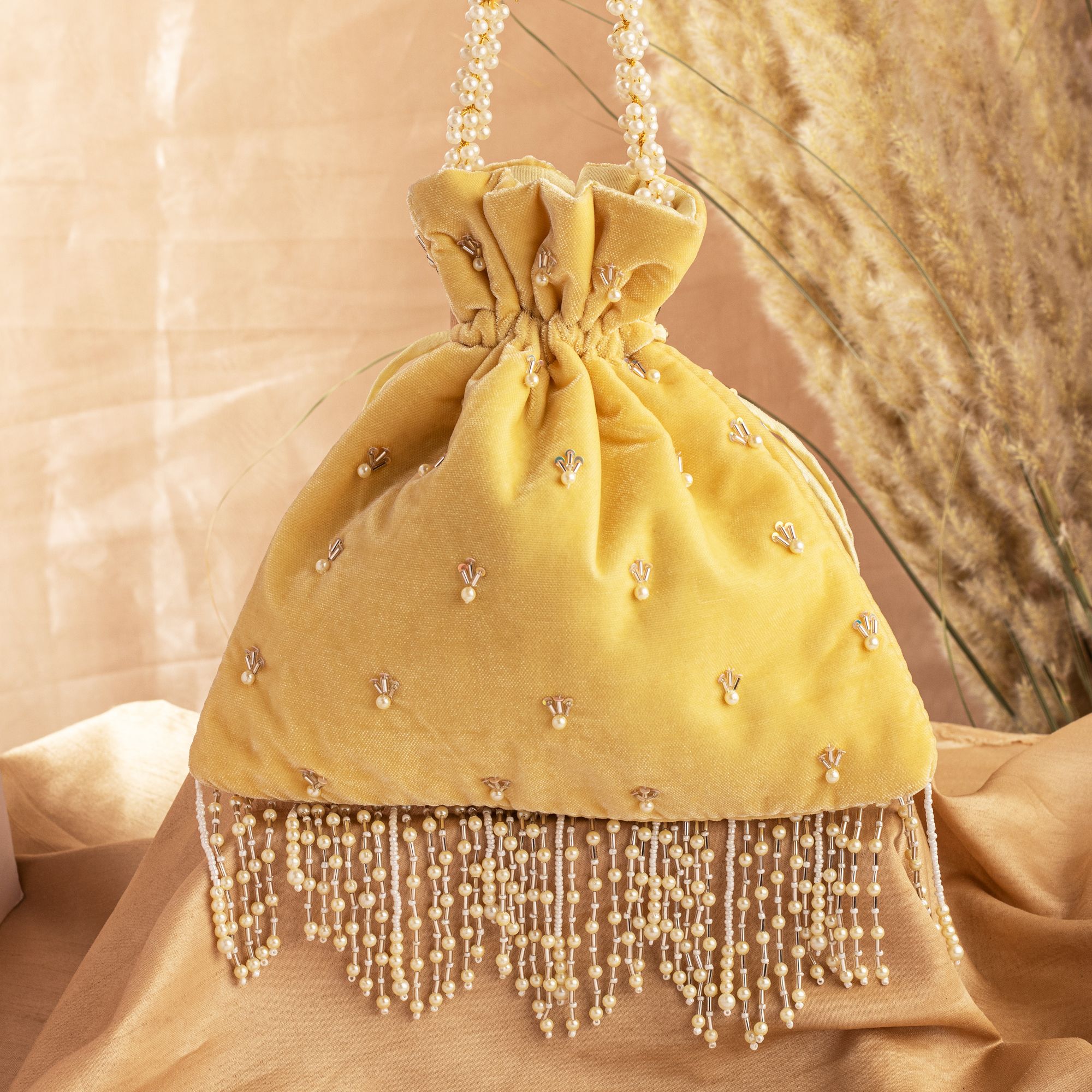 YELLOW VELVET TASSEL POTLI Luxurious Pearl Glass Bead