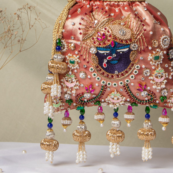 Red Jewellery Shrinathji Tissue Potli | Regal Hand-Embroidered Wedding Potli