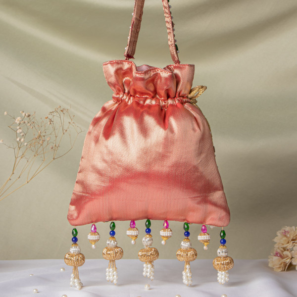 Red Jewellery Shrinathji Tissue Potli | Regal Hand-Embroidered Wedding Potli