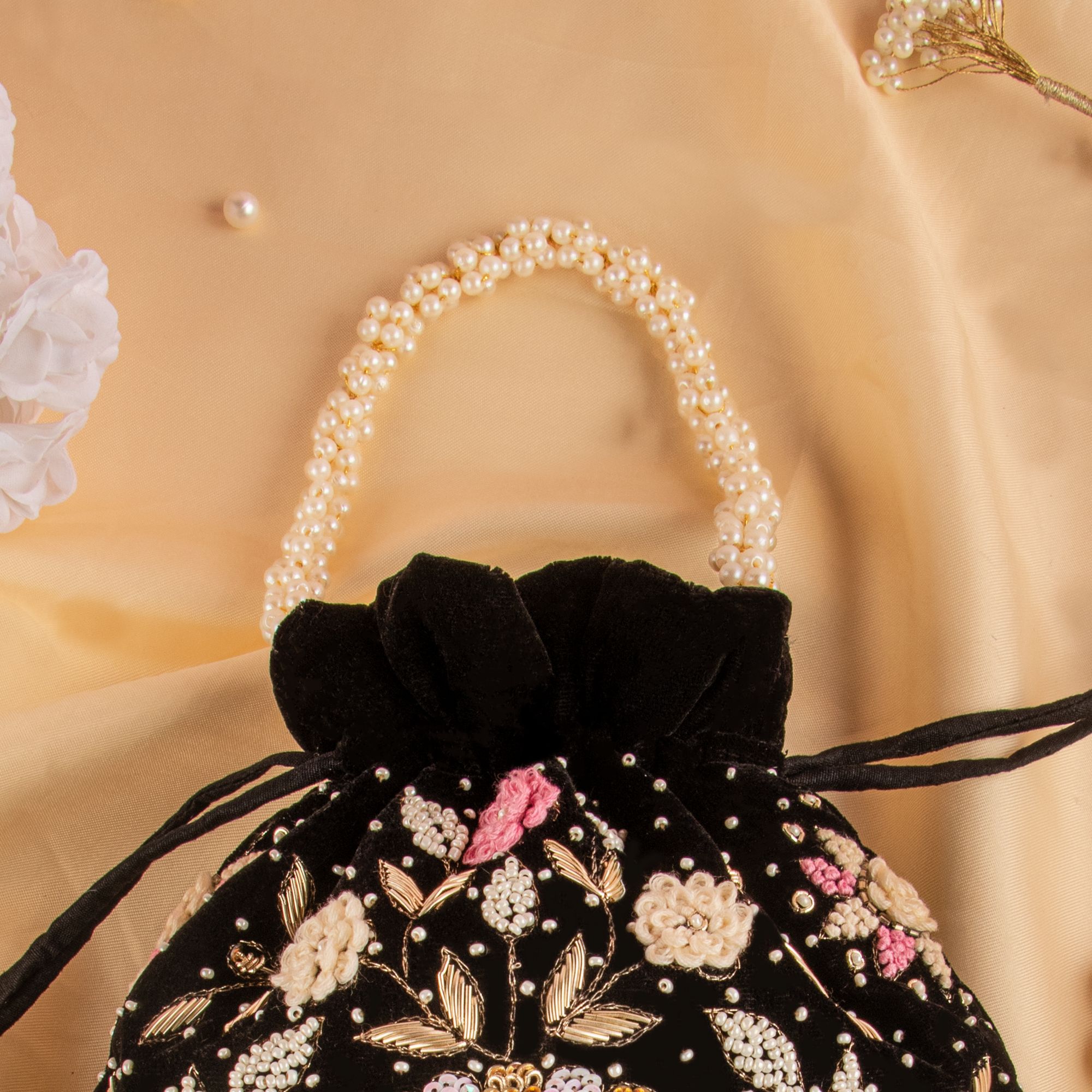 black silk fabric floral texture thread embroider potli bag