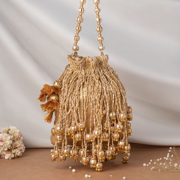 Golden Tissue Fringes Potli