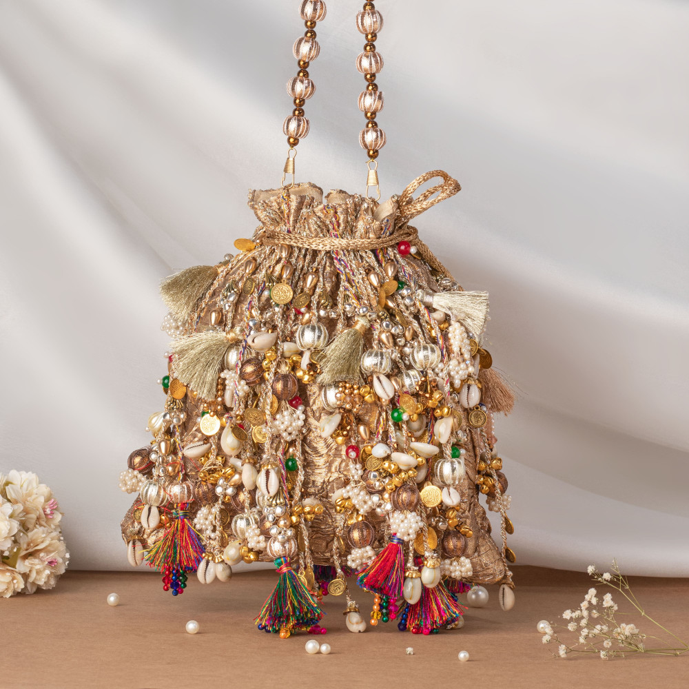 Image of Iconic Antique Gold Crushed Tissue Potli Bag with Embellished Fringes