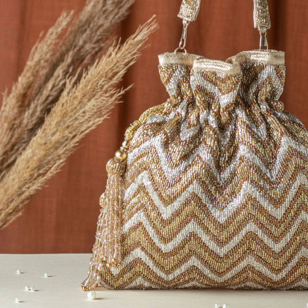Golden & Silver Cut Dana Zigzag Tissue Potli Bag