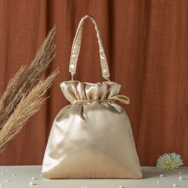 Golden & Silver Cut Dana Zigzag Tissue Potli Bag