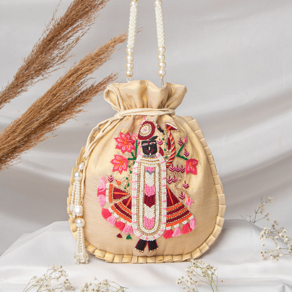 Image of Tissue Gold Shrinath Ji Ethnic Potli Bag | Festive Wedding Wristlet in