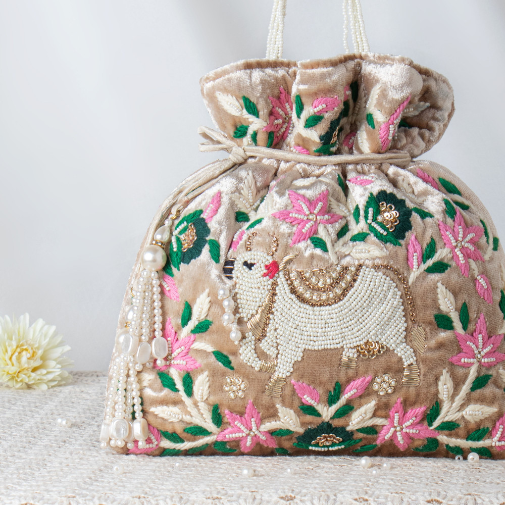 Image of Luxury Velvet Potli Bag with Nandi Thread Embroidery – Handcrafted Ethnic Bag ?✨