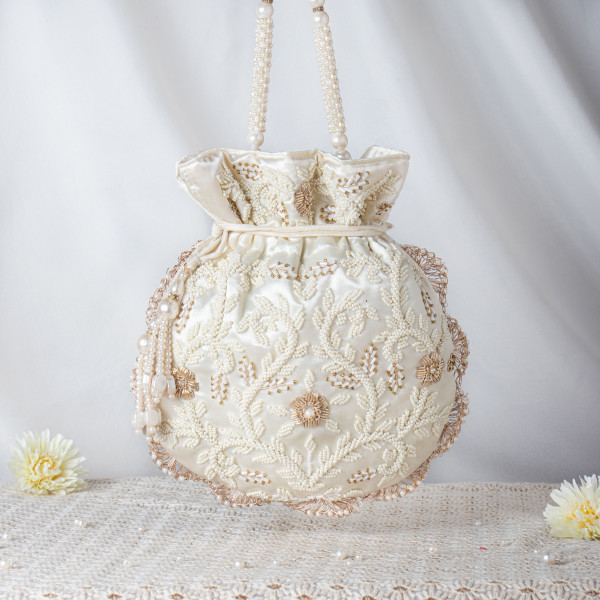 Pearl-Encrusted Ivory Satin Potli Bag – Hand-Beaded Luxe Bridal Pouch ✨?
