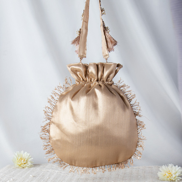 Golden Shimmer Potli Bag with Elephant Motif and Traditional Zari Embroidery ✨?