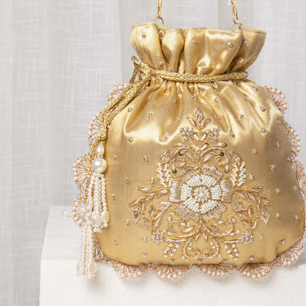 Shimmering Ivory Tissue Zardosi Potli – Hand-Embellished Scalloped Bridal Bag