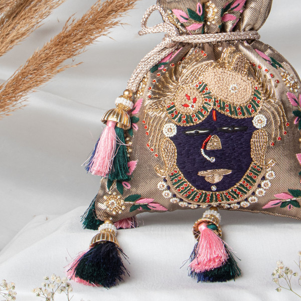 Mukharbin Shrinath Ji Embroidered Heritage Potli Bag – Antique Gold