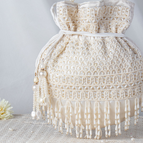 Handcrafted Off-White Pearl Potli Bag – Luxury Beaded Bridal Batua with Waterfall Fringe